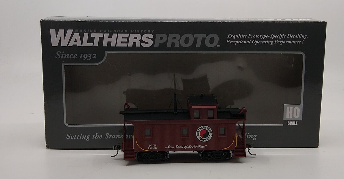 Walthers 920-103454 HO Scale Northern Pacific Caboose #1285 – Trainz